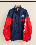 Chaqueta cortaviento infantil Adidas azul marino con rojo | Talla 11–12 años