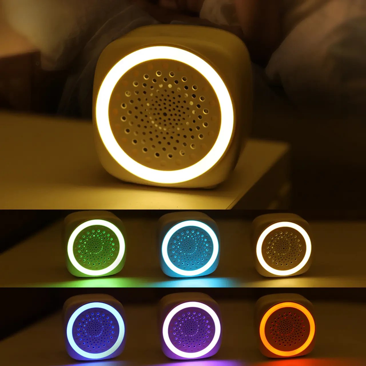 Vamos Niños altavoz de sonido blanco portátil con luz ambiental personalizable en naranja, rosa y verde. Ideal para bebés.