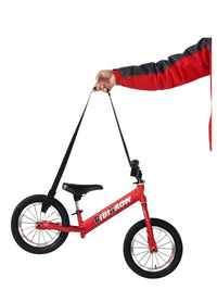 Correa de transporte ajustable Vamos Niños de nailon negro cargando una bicicleta infantil roja con hombrera acolchada
