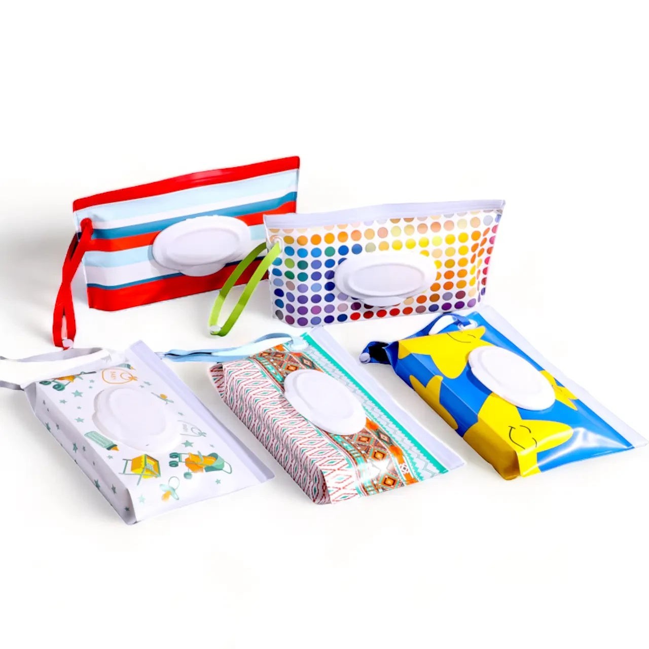 Estuches portátiles para toallitas Vamos Niños con diseños coloridos, tapa abatible y correa de transporte.