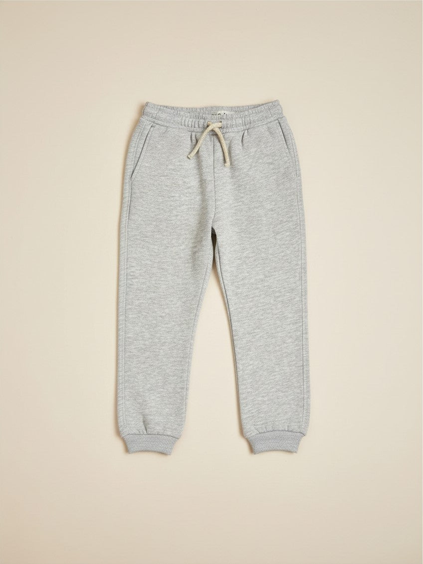 Pantalón de buzo unisex Vamos Niños Lefties en color gris claro con cintura elástica y cordón ajustable