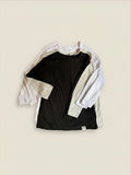 Pack de 4 poleras de niño Vamos Niños marca Lefties en colores blanco, negro y gris claro, talla 6.