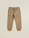 Pantalón de buzo Vamos Niños marca Lefties color café claro con cintura elástica y cordón ajustable para niña