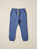 Pantalón de buzo unisex Vamos Niños Lefties en color celeste claro con cintura elástica y cordón ajustable
