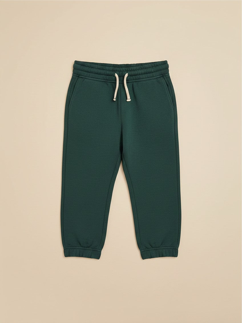 Pantalón de buzo verde oscuro para niño de Vamos Niños con cintura elástica y cordón ajustable