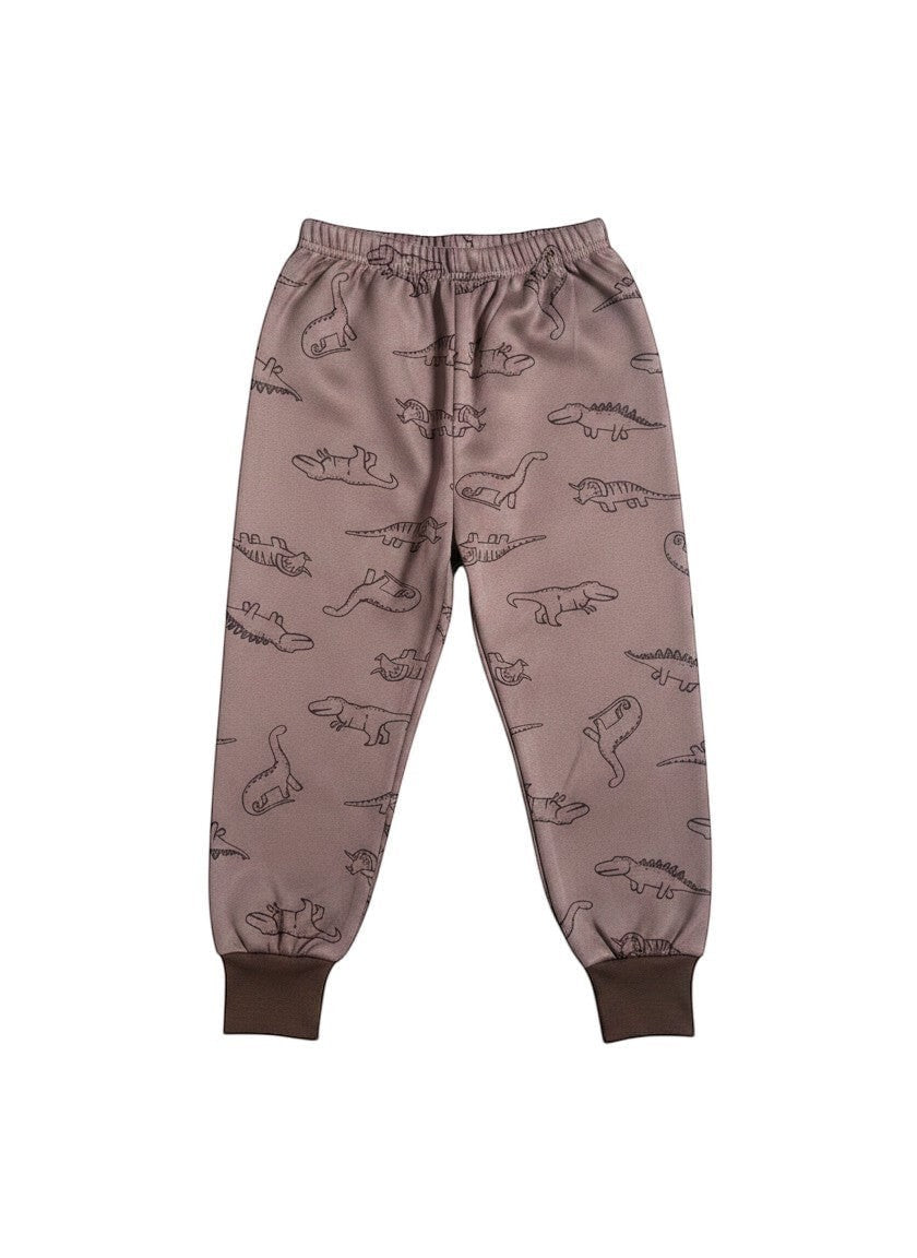 Pantalón de pijama afranelado Vamos Niños color café con estampado de dinosaurios y puños elásticos