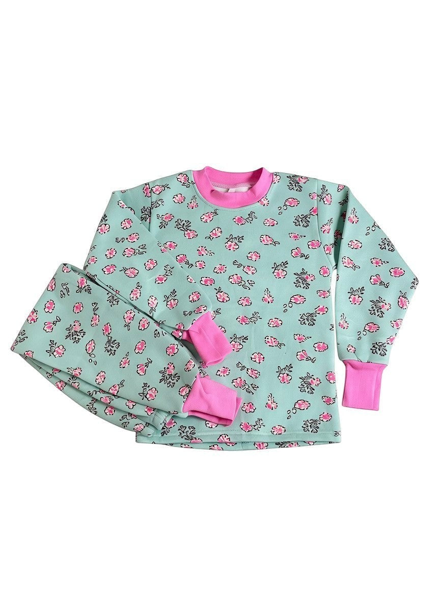 Pijama afranelado Vamos Niños de dos piezas en color celeste con estampado de flores rosadas y puños elásticos