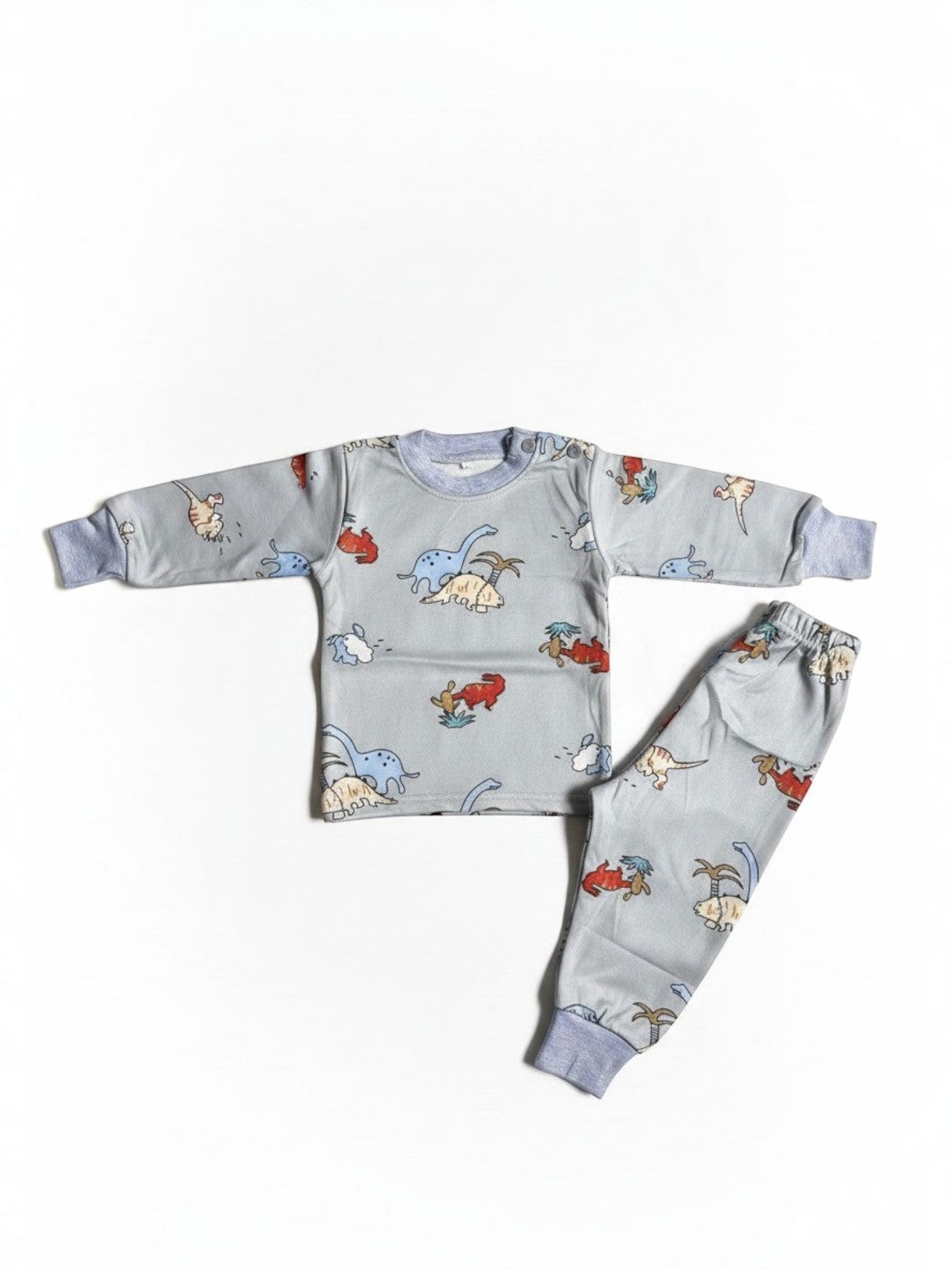 Pijama afranelado Vamos Niños de dos piezas en color gris con estampado de dinosaurios y puños elasticados