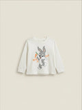 Polera beige de manga larga para bebé de Vamos Niños con estampado de Baby Box Bunny y zanahoria