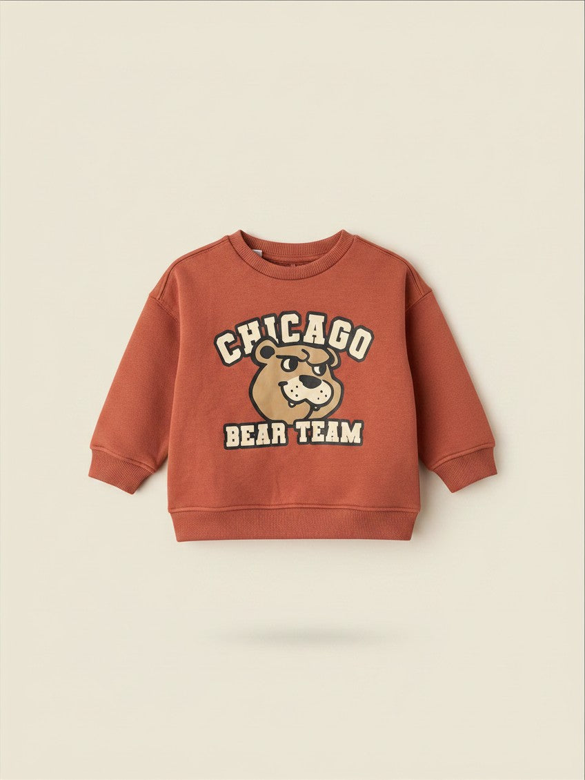 Polerón Vamos Niños Lefties color terracota para bebé con estampado de oso Chicago Bear Team