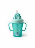 Vaso de aprendizaje verde azulado de Vamos Niños con asas, pajita y diseño de elefante y luna. Ideal para bebés.